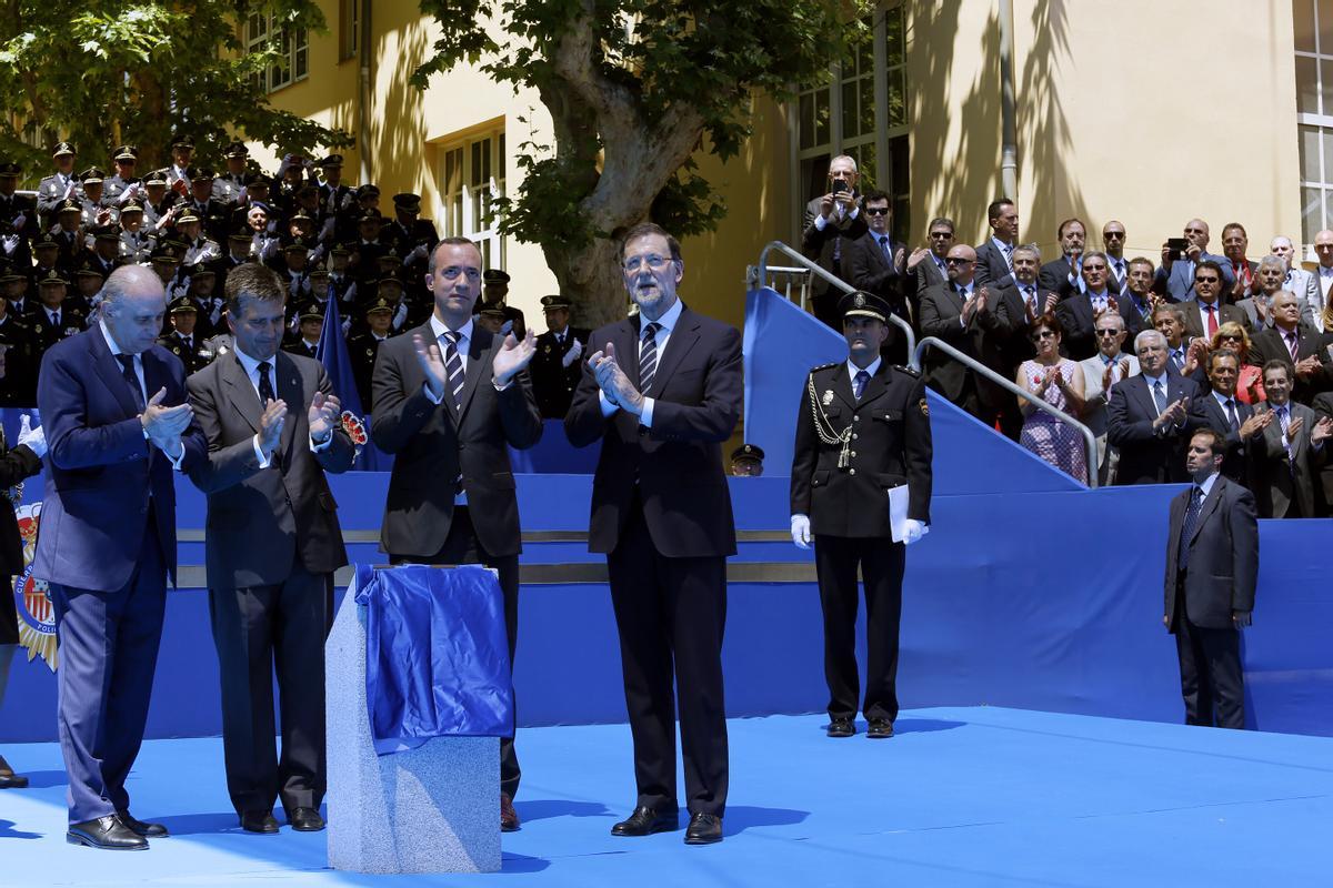De izquierda a derecha Jorge Fernández Díaz, Ignacio Cosidó, Francisco Martínez y Mariano Rajoy en un acto celebrado en 2014