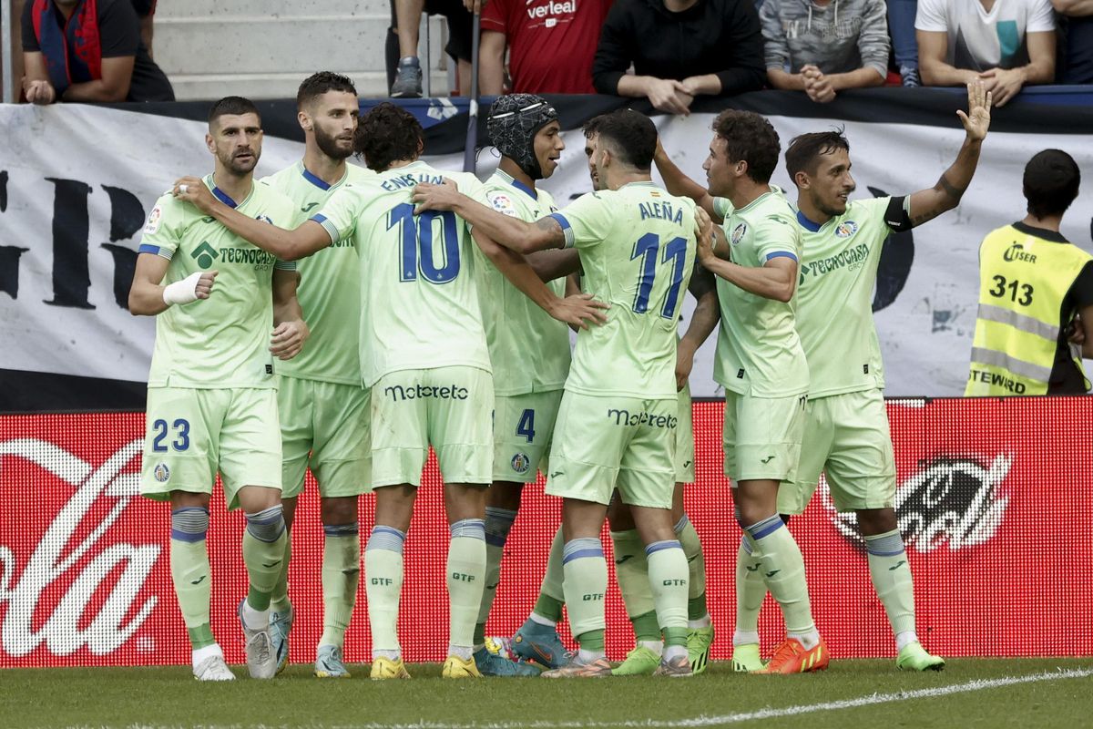 Los jugadores del Getafe celebran el segundo gol contra Osasuna en el estadio de El Sadar. Los jugadores del Getafe celebran el segundo gol contra Osasuna en el estadio de El Sadar.