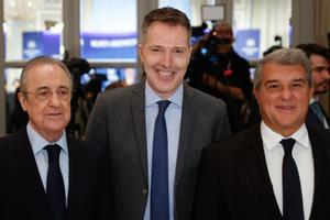Florentino y Laporta con el CEO de la Superliga, Bernd Reichart.