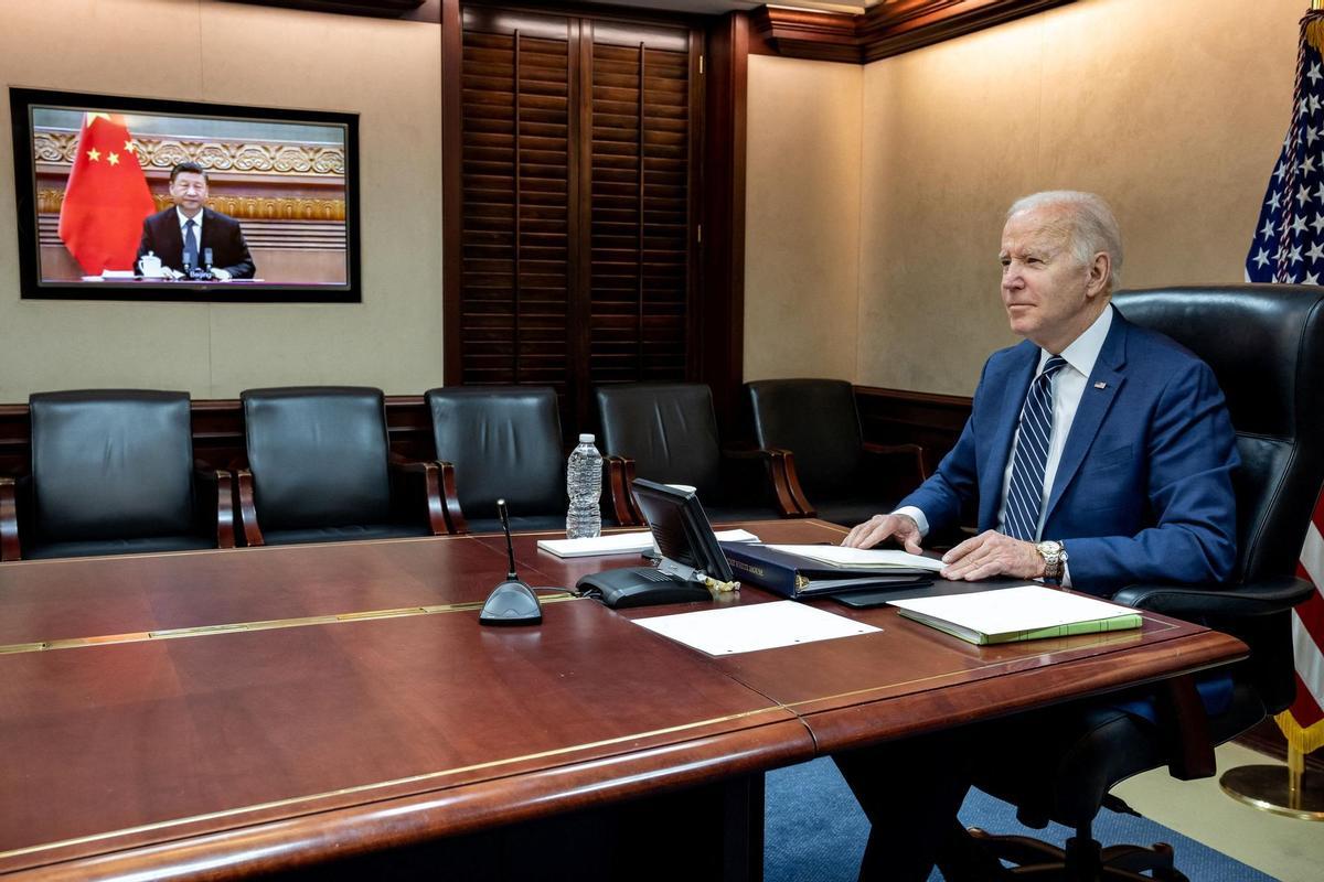 U.S. President Joe Biden speaks by video with Chinese President Xi Jinping from the Situation Room of the White House in Washington